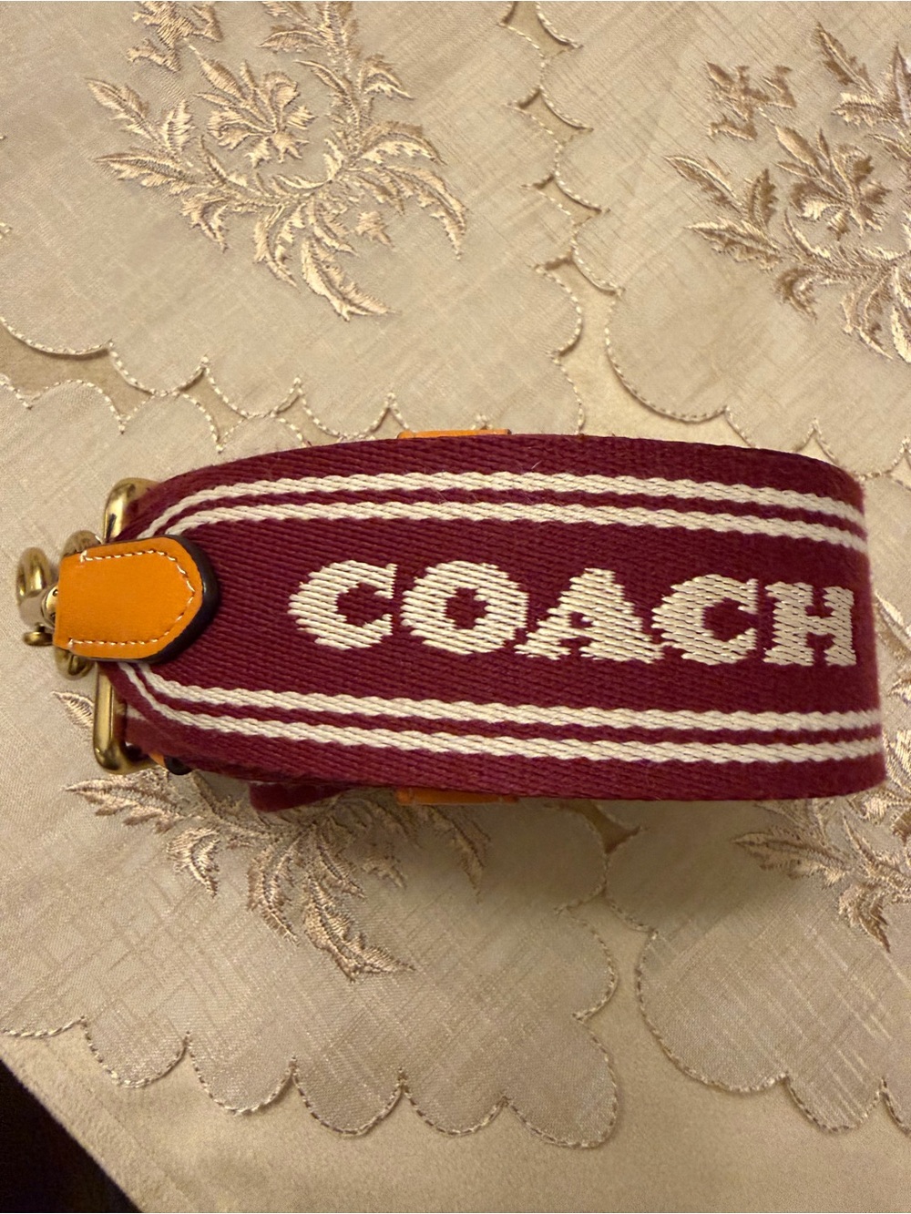 Coach Burgundy Jacquard Logo Strap with Tan Leather Tabs